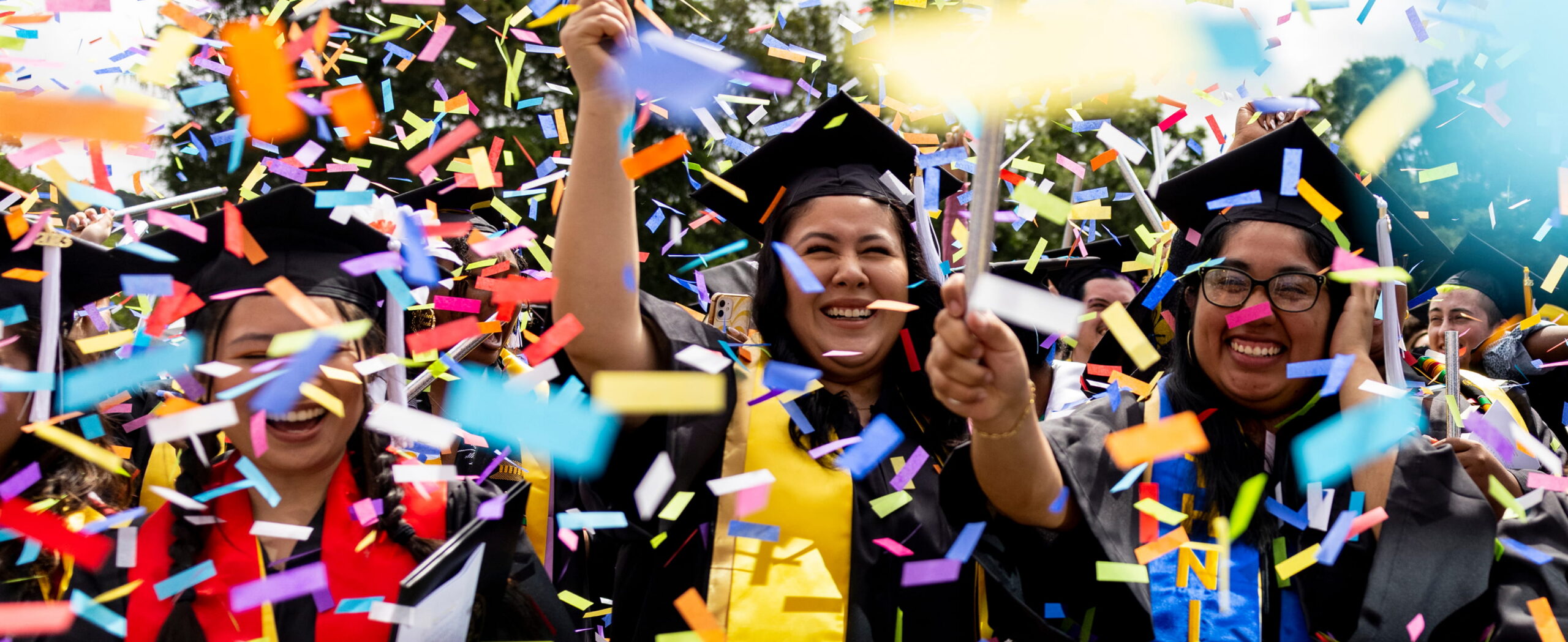 student celebrating college graduation